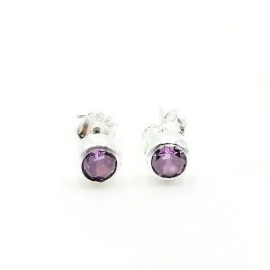 Aretes puntito de circonias moradas