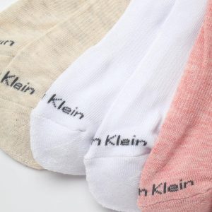 Calvin Klein Calcetines altos para mujer, paquete de 12 calcetines deportivos transpirables con cojines de rizo para mujer (talla de zapato: 4-10)