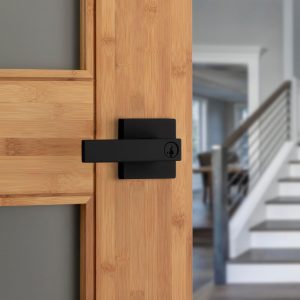 Kwikset Singapore Entry Door Handle with Lock and Key, Secure Keyed Reversible Lever Exterior, For Front Entrance and Bedrooms, Matte Black, Pick Resistant Smartkey Rekey Security and Microban